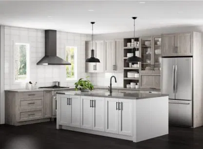Custom kitchen cabinetry installation showing white shaker style cabinets and drawers