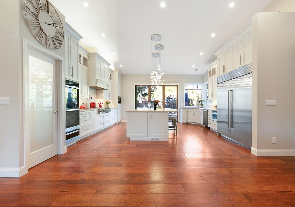 Modern kitchen countertops display in showroom featuring various materials and finishes